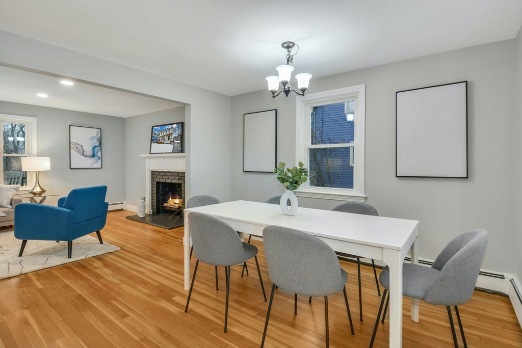 42 Riverside Avenue Concord, MA 01742 - Photo 4 of 21 a view of a dining room with furniture window and wooden floor