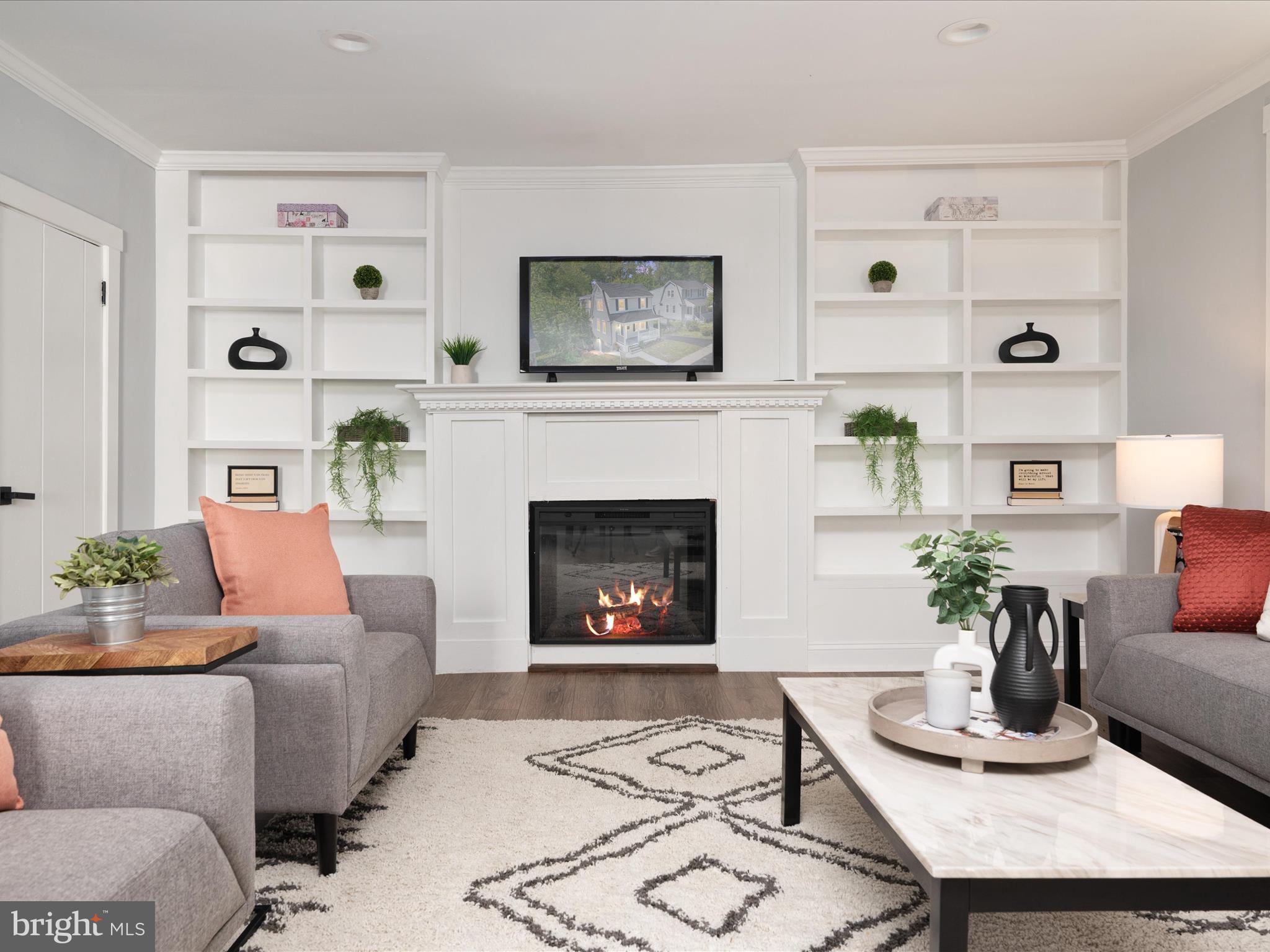 1119 Overbrook Road Baltimore, MD 21239 - Photo 21 of 72 a living room with furniture and a fireplace