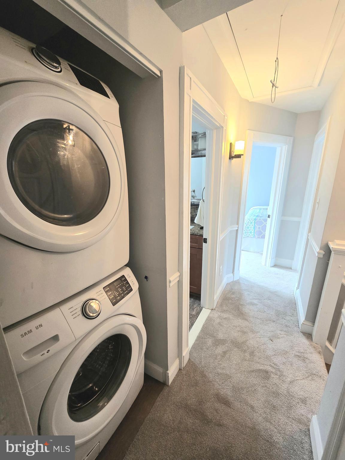 1119 Overbrook Road Baltimore, MD 21239 - Photo 40 of 72 a view of a storage and utility room with washer and dryer