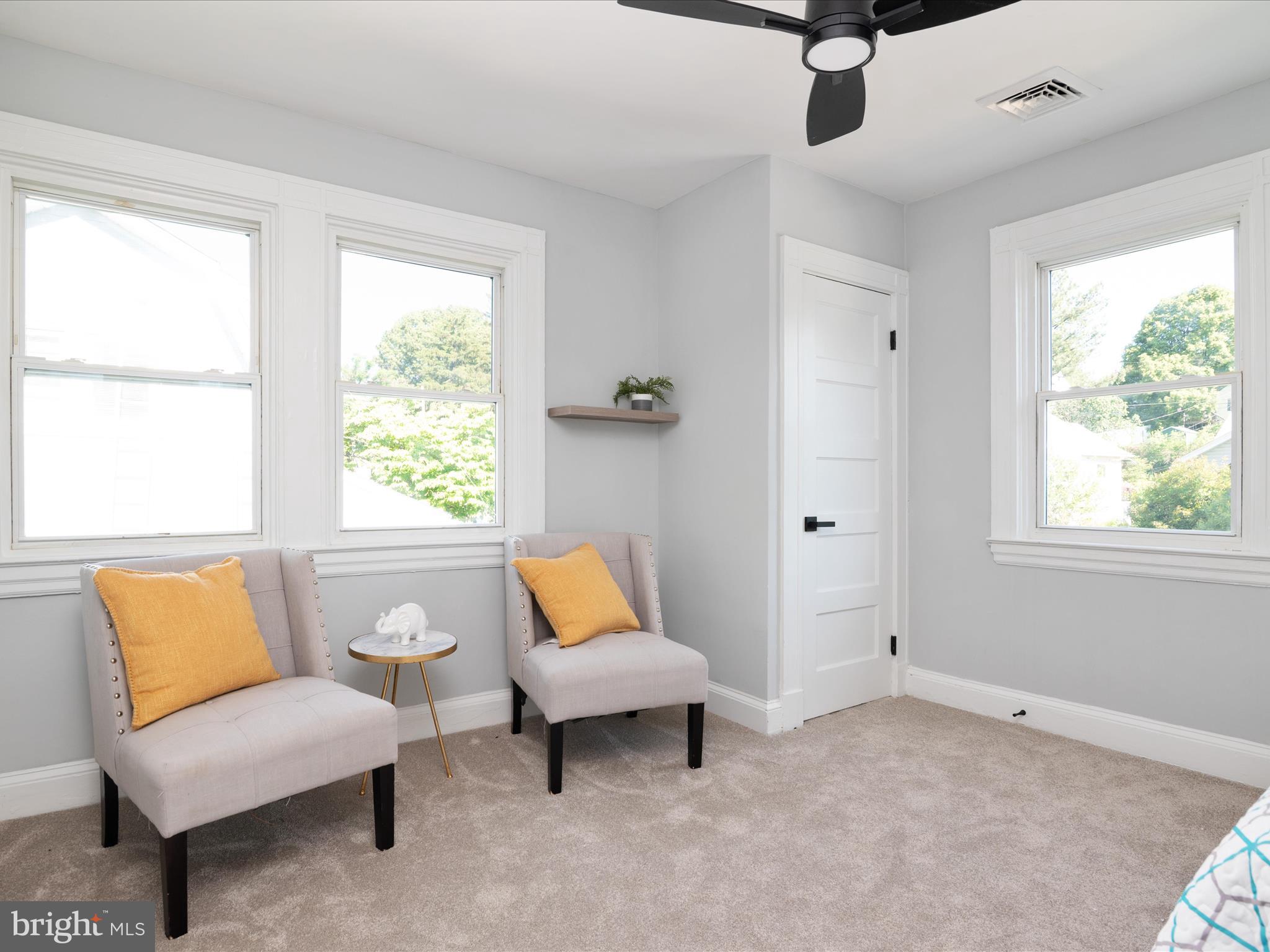 1119 Overbrook Road Baltimore, MD 21239 - Photo 42 of 72 a living room with furniture and a window