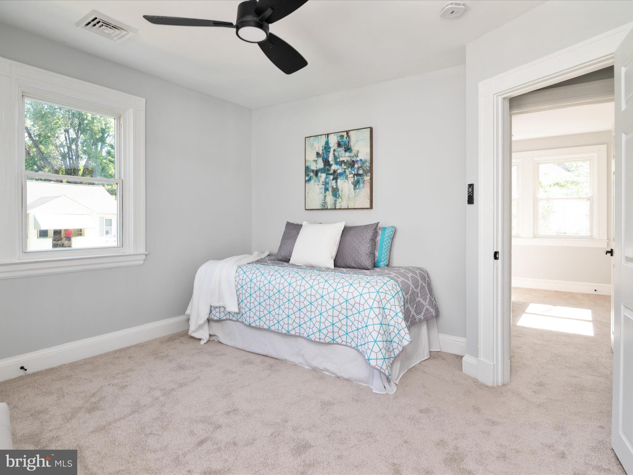 1119 Overbrook Road Baltimore, MD 21239 - Photo 43 of 72 a bedroom with a bed and a window