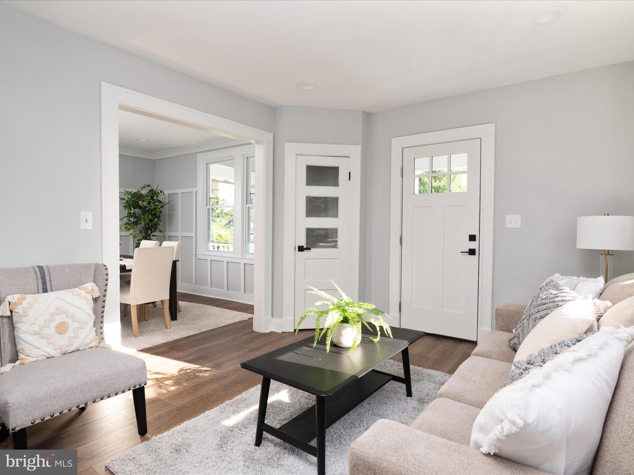 1119 Overbrook Road Baltimore, MD 21239 - Photo 9 of 72 a living room with furniture and wooden floor