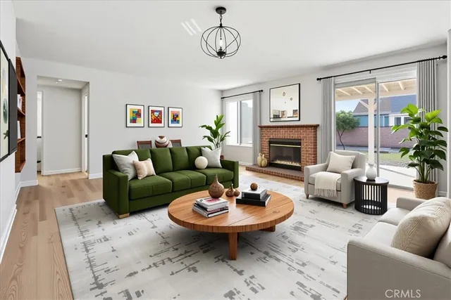 a bedroom with two beds and a large window