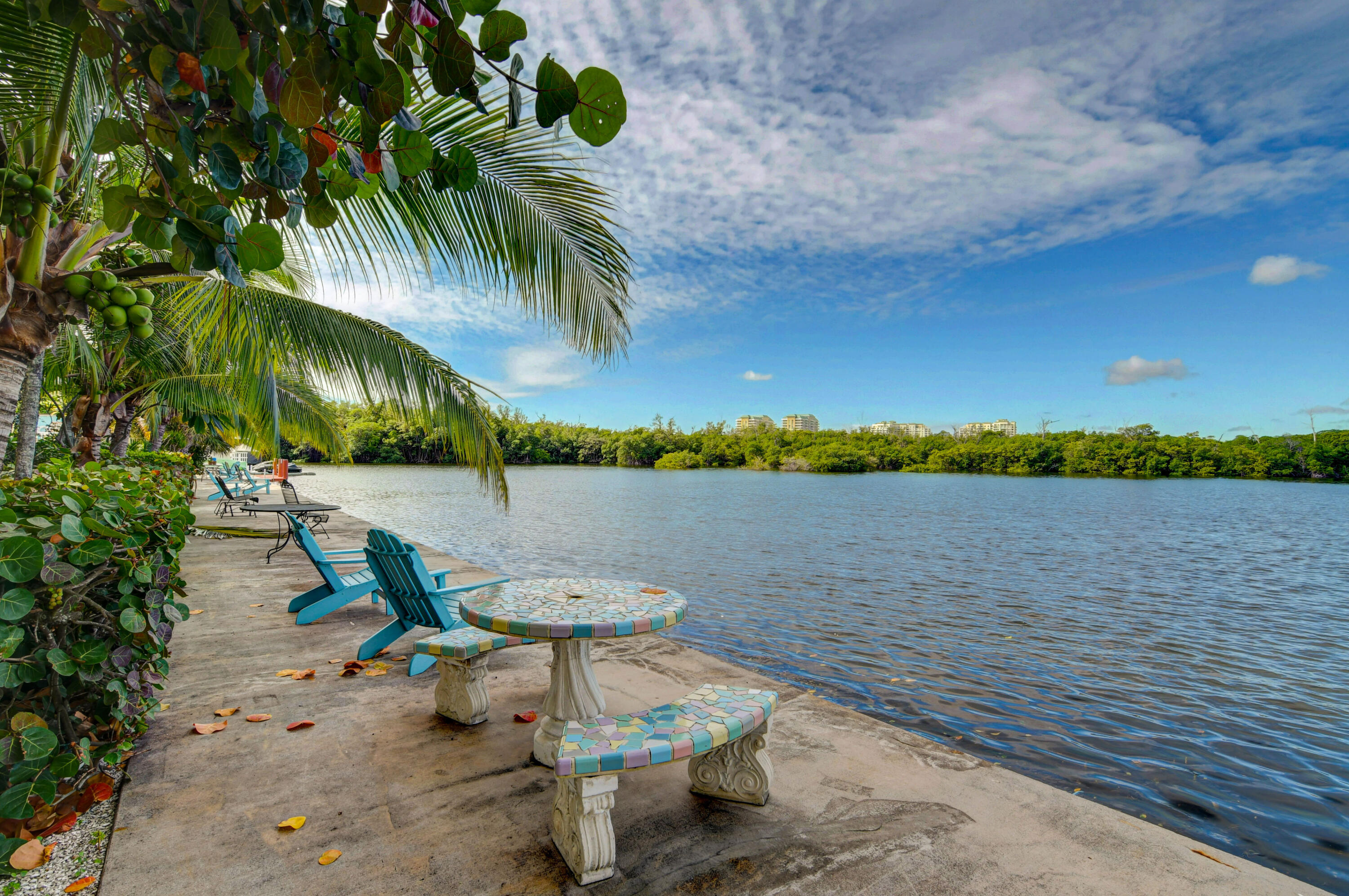 6520 North Ocean Boulevard, Unit 240 Ocean Ridge, FL 33435 - Photo 24 of 29 a view of a lake with outdoor space