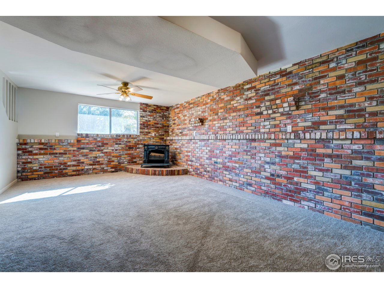 1025 Timber Lane Fort Collins, CO 80521 - Photo 12 of 25 Large Rec Room Lower Level