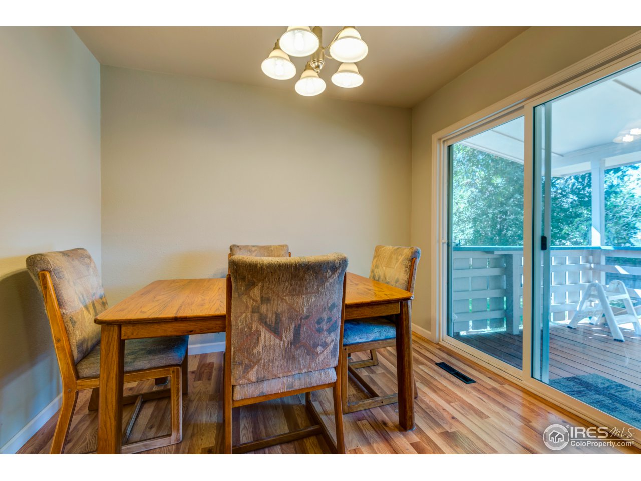 1025 Timber Lane Fort Collins, CO 80521 - Photo 10 of 25 Dining Rm Exit to Covered Deck