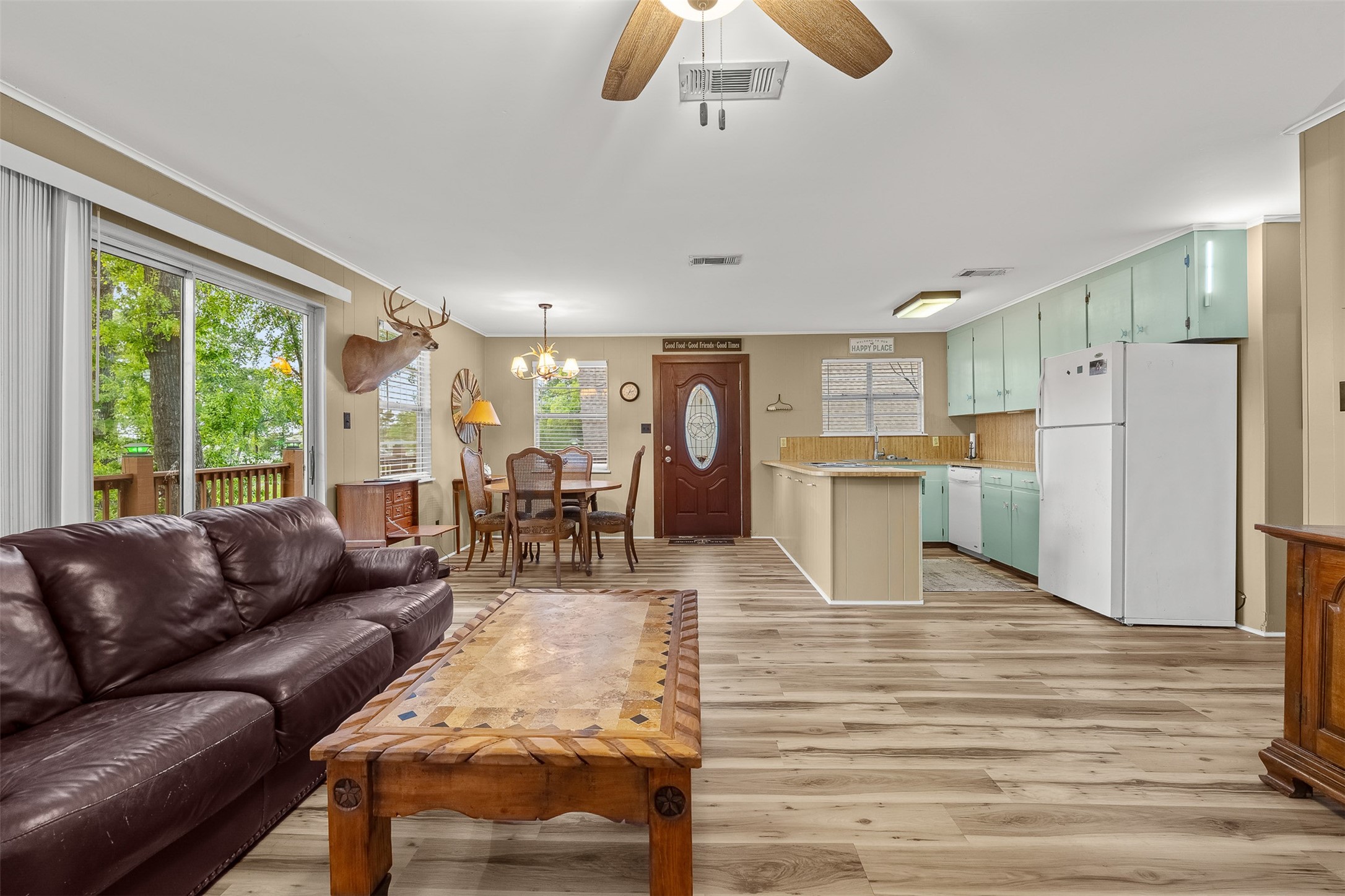 439 Lakeview Harbor Onalaska, TX 77360 - Photo 14 of 43 a living room with furniture wooden floor and large window