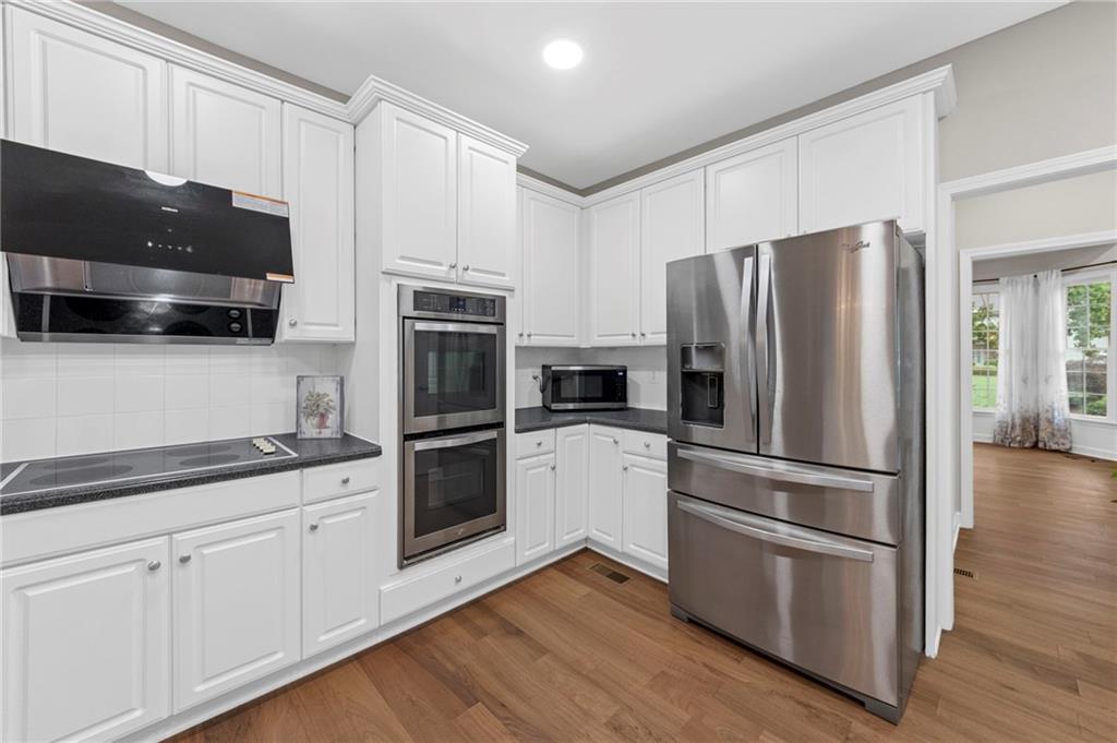 6455 Rutherford Place Suwanee, GA 30024 - Photo 14 of 65