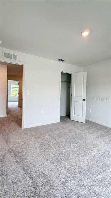 5174 Clay Whaley Road St. Cloud, FL 34772 - Photo 23 of 25 a view of an empty room and window