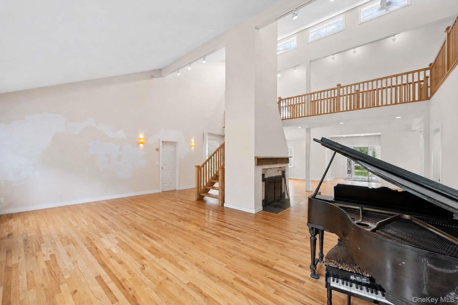 131 Red Creek Road Hampton Bays, NY 11946 - Photo 35 of 35 a view of entryway with wooden floor
