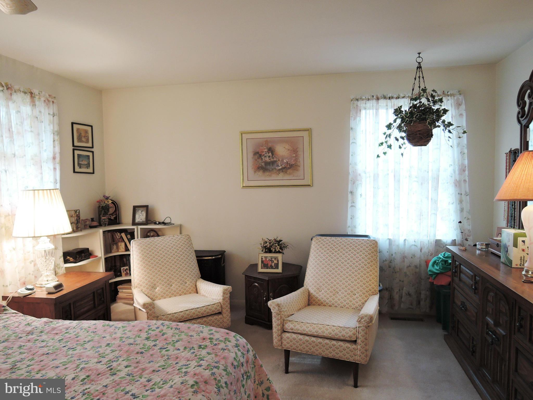 1010 Cold Bottom Road Sparks, MD 21152 - Photo 16 of 30 a living room with furniture and a chandelier
