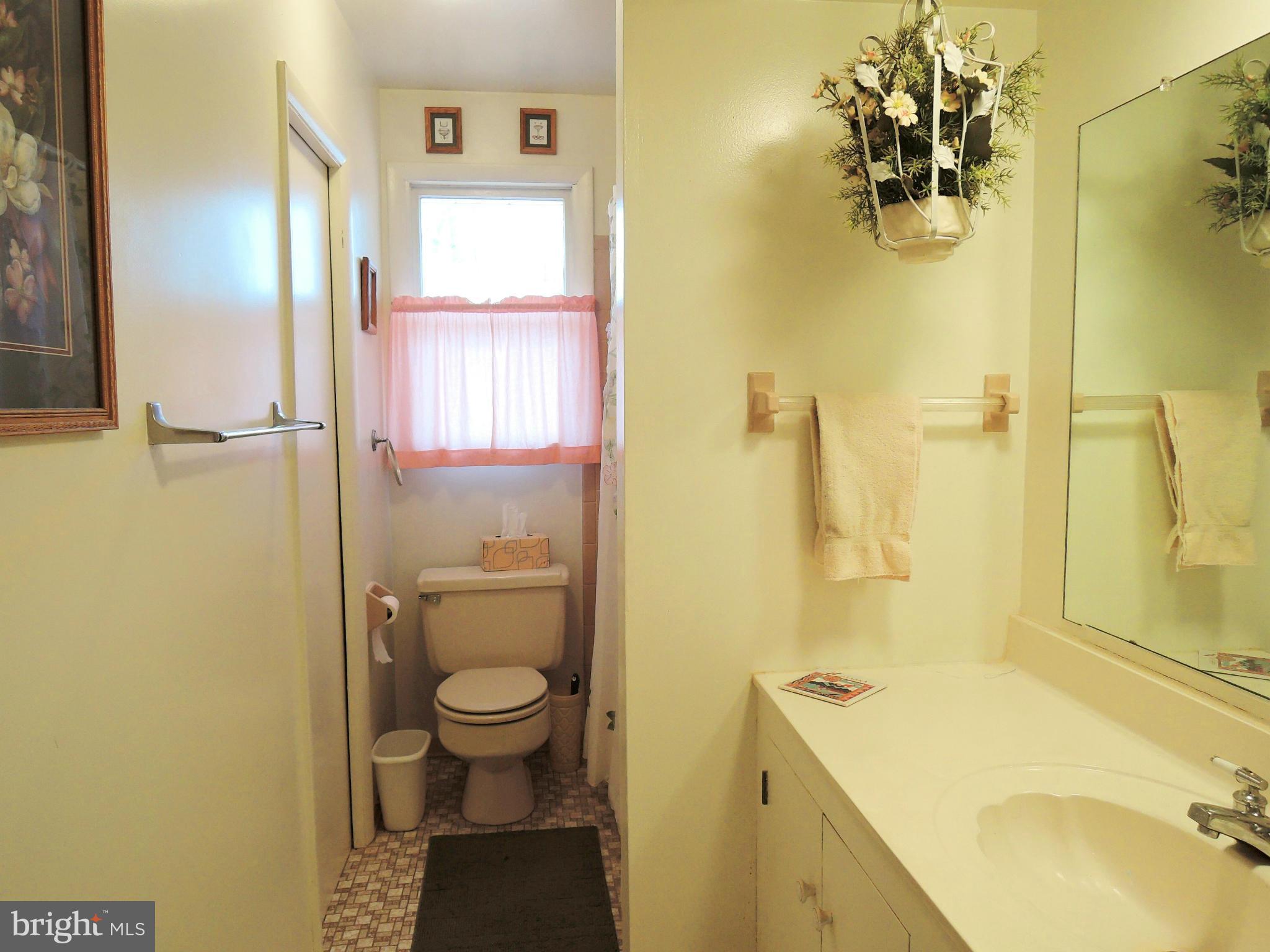 1010 Cold Bottom Road Sparks, MD 21152 - Photo 18 of 30 a bathroom with a granite countertop sink toilet and shower