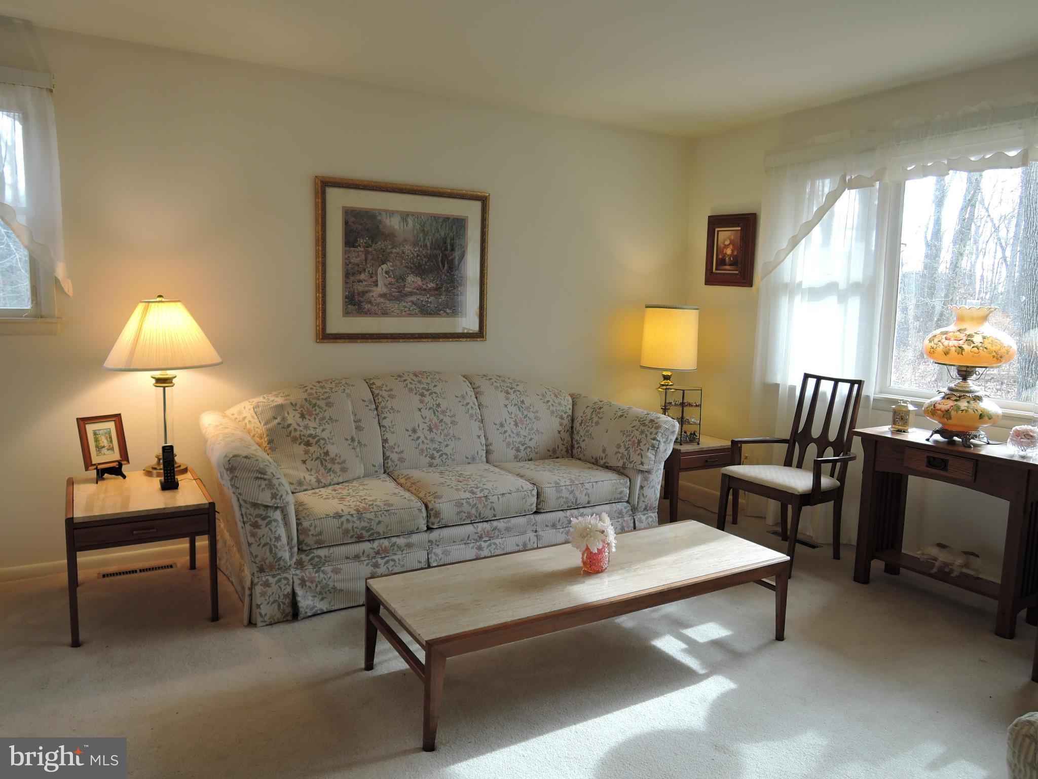 1010 Cold Bottom Road Sparks, MD 21152 - Photo 8 of 30 a living room with furniture and a lamp