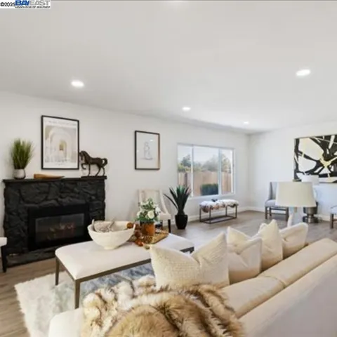 a spacious bedroom with a bed and a window