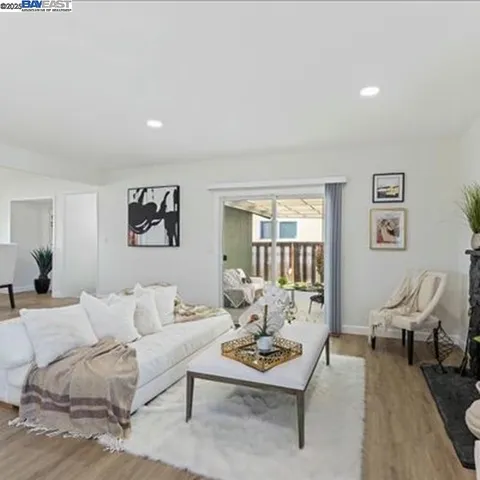 a room with gym equipment and a large window