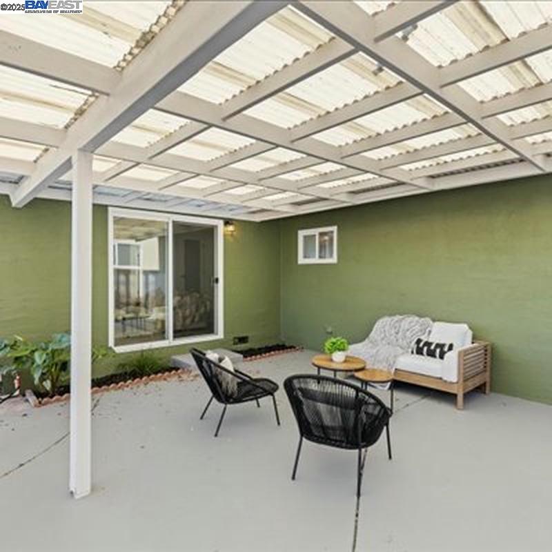 3184 Waugh Place Fremont, CA 94536 - Photo 29 of 47 a living room with furniture and a wooden floor