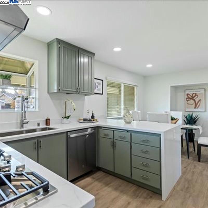 3184 Waugh Place Fremont, CA 94536 - Photo 6 of 47 a kitchen with a sink and cabinets