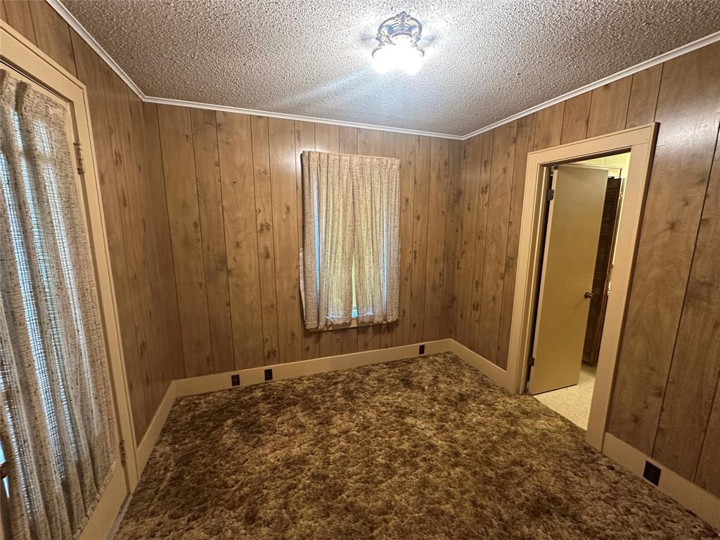 2276 Main Street Haynesville, LA 71038 - Photo 16 of 22 a view of a bathroom with a shower and a sink