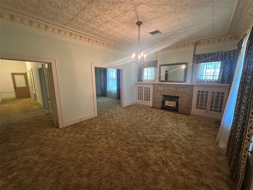 2276 Main Street Haynesville, LA 71038 - Photo 20 of 22 a view of livingroom with hardwood floor and a ceiling fan
