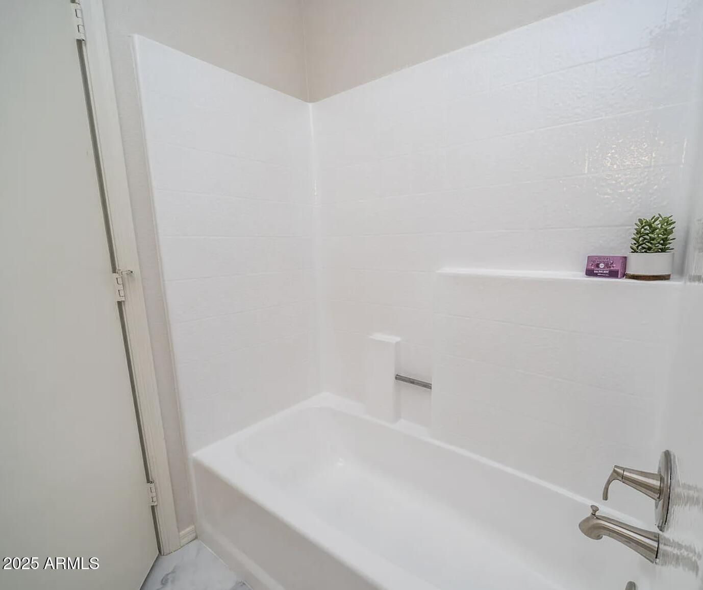 1329 South Mitchell Drive Tempe, AZ 85281 - Photo 12 of 21 a bathroom with a bathtub