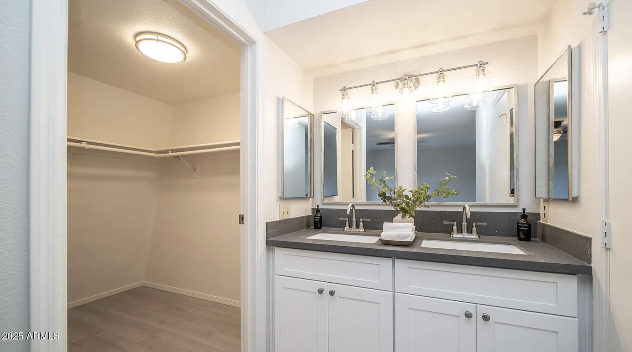 1329 South Mitchell Drive Tempe, AZ 85281 - Photo 16 of 21 a bathroom with double vanity sink and a mirror