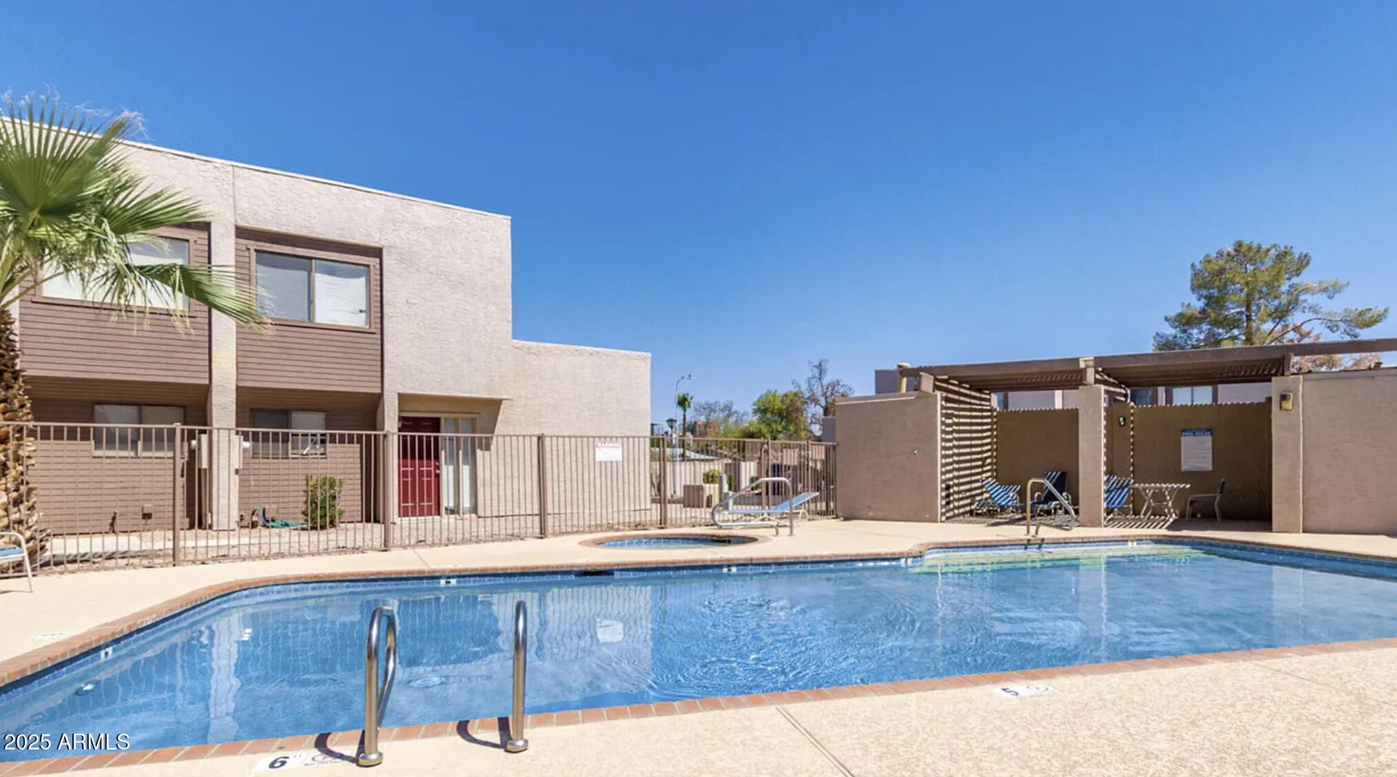 1329 South Mitchell Drive Tempe, AZ 85281 - Photo 21 of 21 a view of a house with a swimming pool