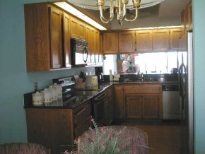 375-48 London Bridge Road, Unit 48 Lake Havasu City, AZ 86403 - Photo 4 of 9 a kitchen with a sink and a window