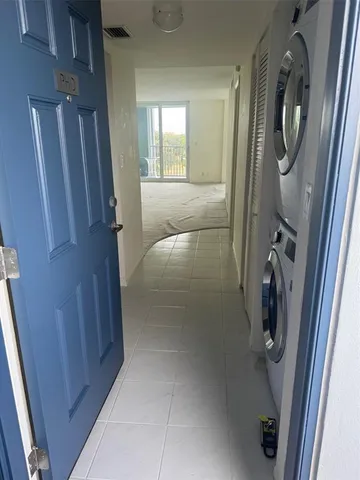 a bathroom with a shower and mirror