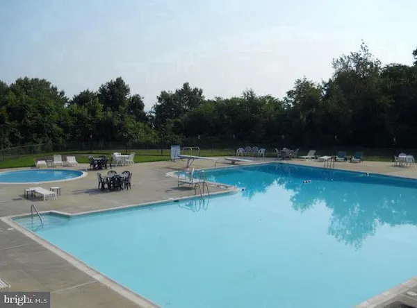 a view of a lake with a yard