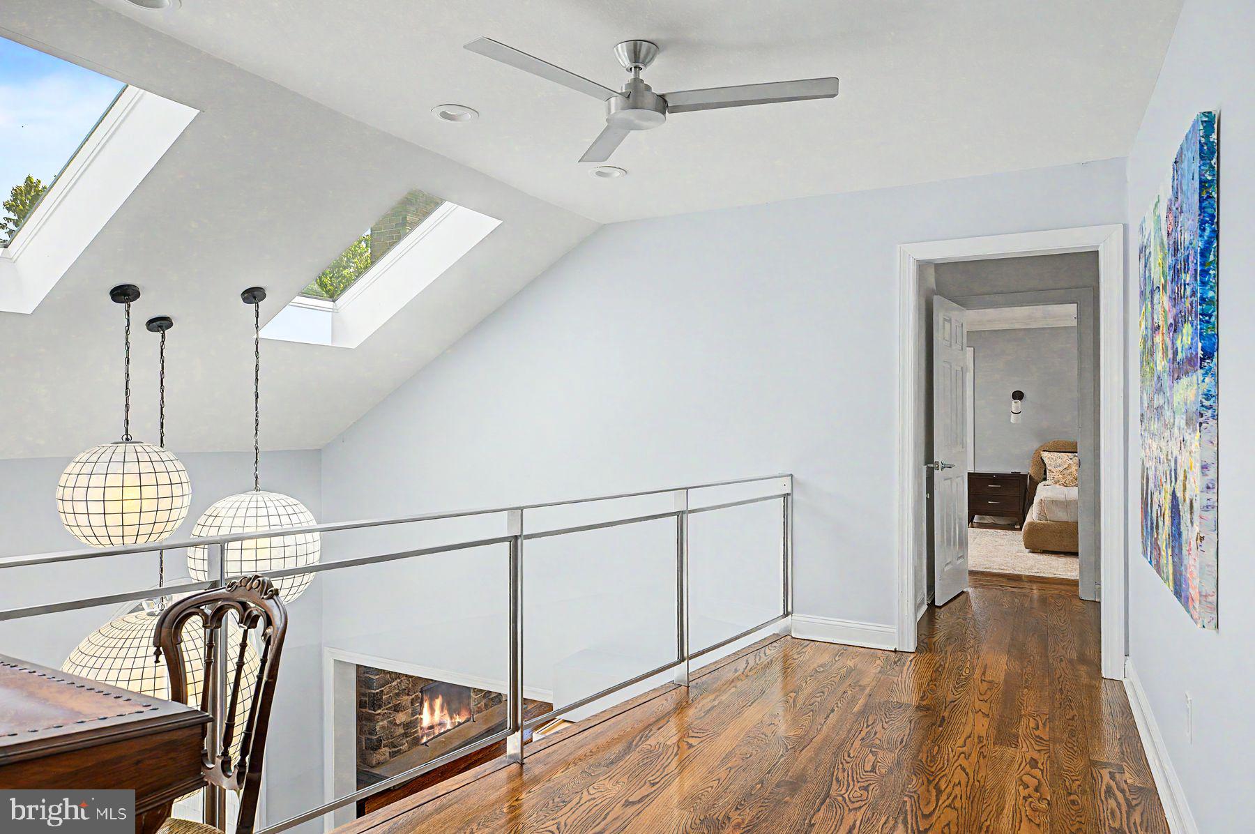 4009 Smoke Road Doylestown, PA 18902 - Photo 36 of 52 a view of a hallway with wooden floor and staircase