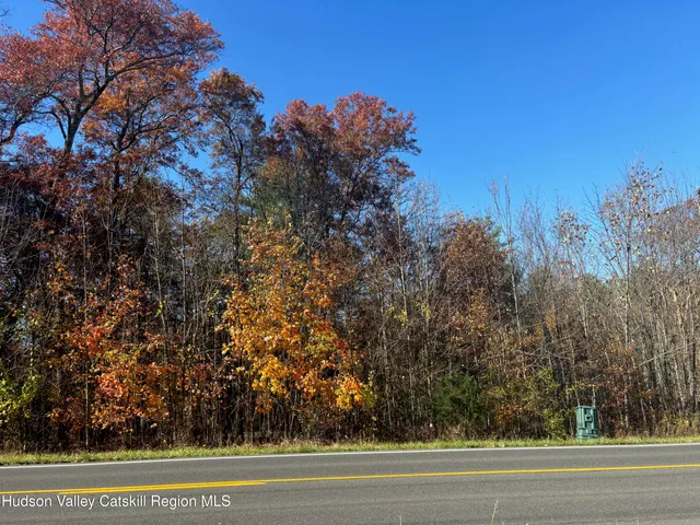 a view of a street with a street sign