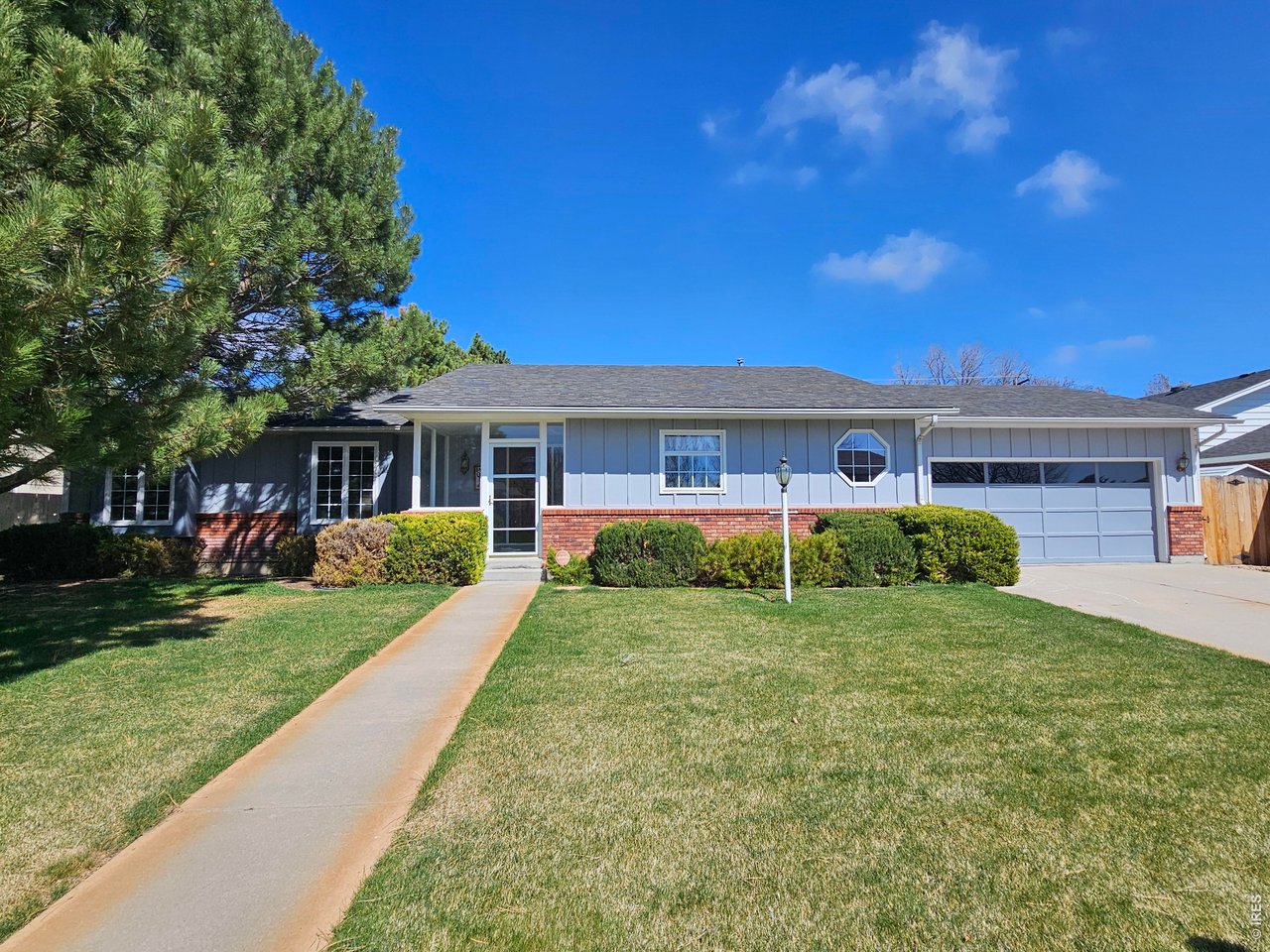 1010 Fairhurst Street Sterling, CO 80751 - Photo 1 of 36 a view of a house with a yard