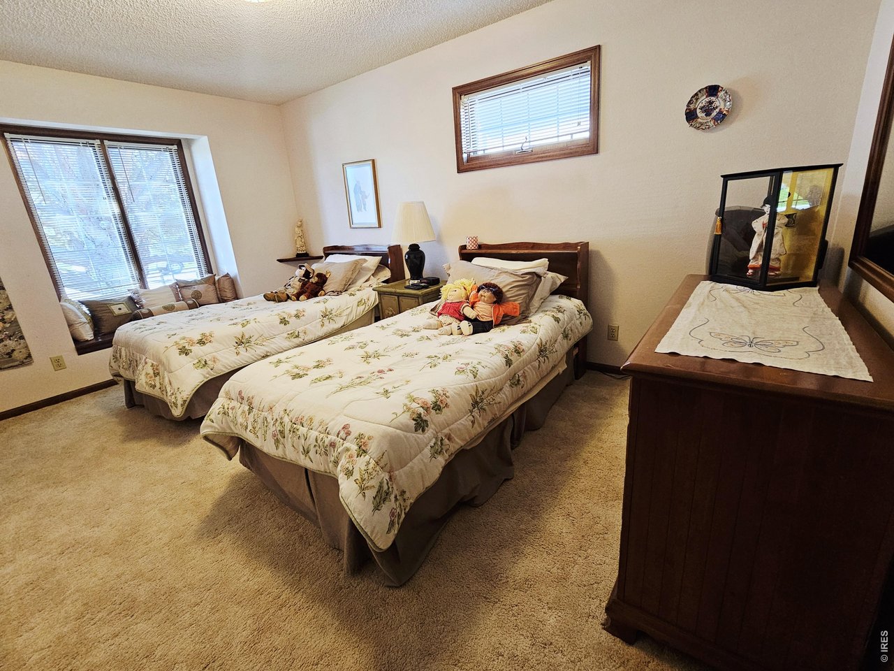 1010 Fairhurst Street Sterling, CO 80751 - Photo 20 of 36 a bedroom with bed and window