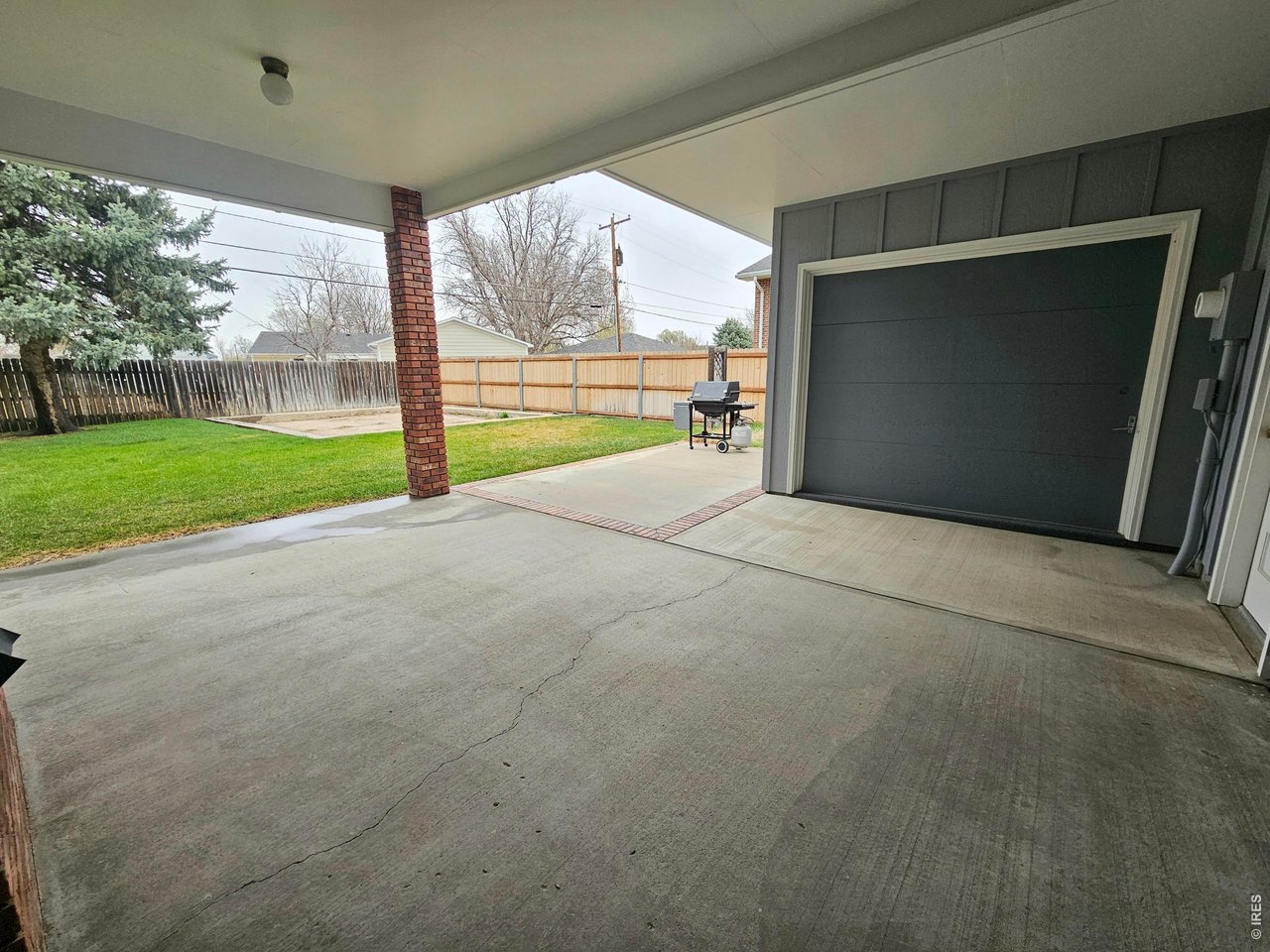 1010 Fairhurst Street Sterling, CO 80751 - Photo 29 of 36 a view of outdoor space with sliding door and garden view