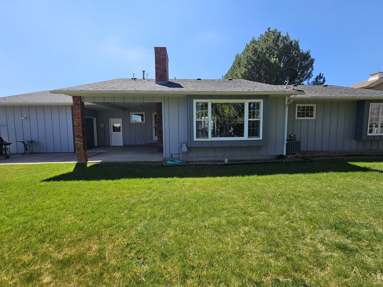 1010 Fairhurst Street Sterling, CO 80751 - Photo 32 of 36 a front view of a house with garden