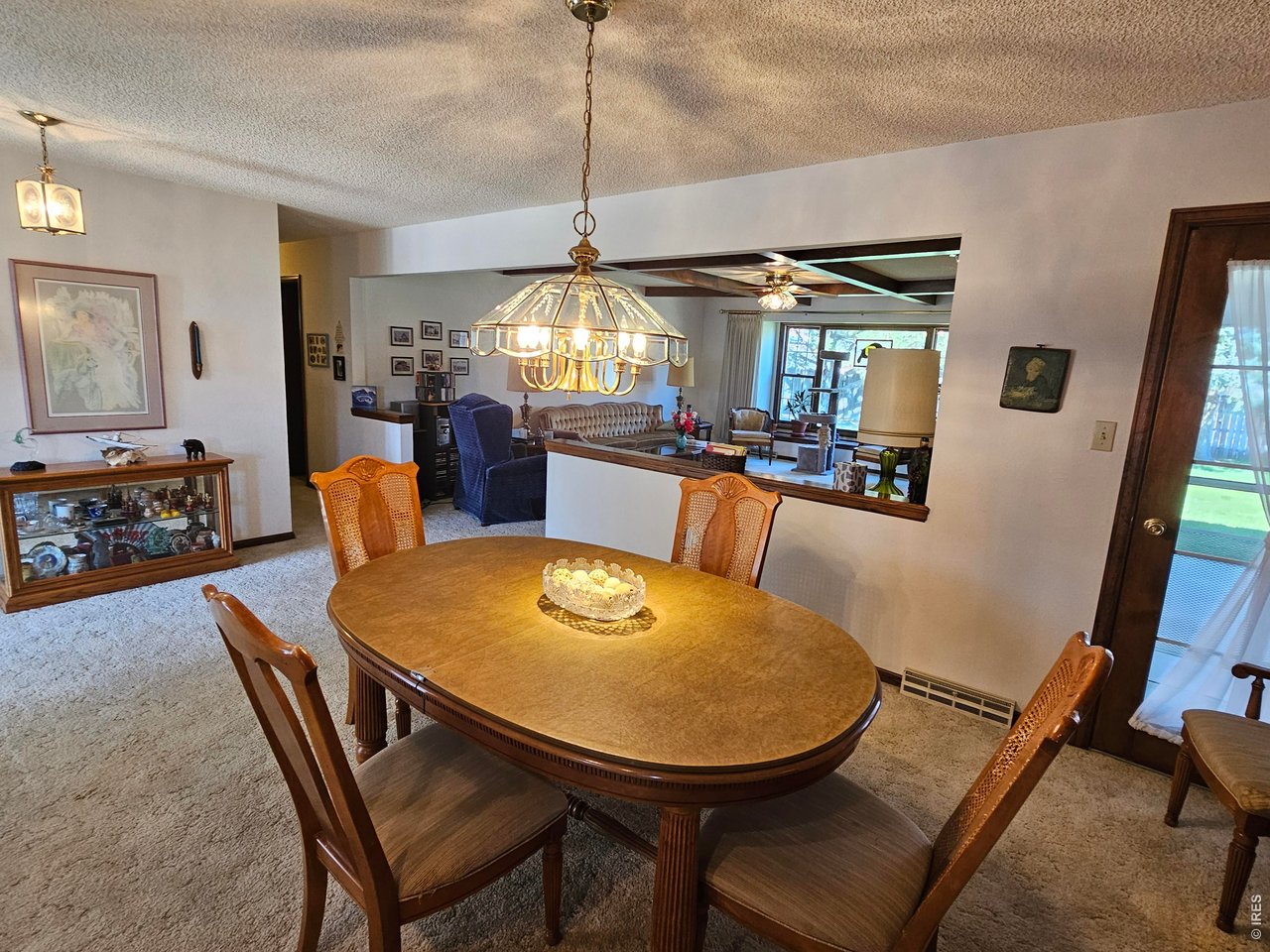 1010 Fairhurst Street Sterling, CO 80751 - Photo 8 of 36 a view of a dining room with furniture
