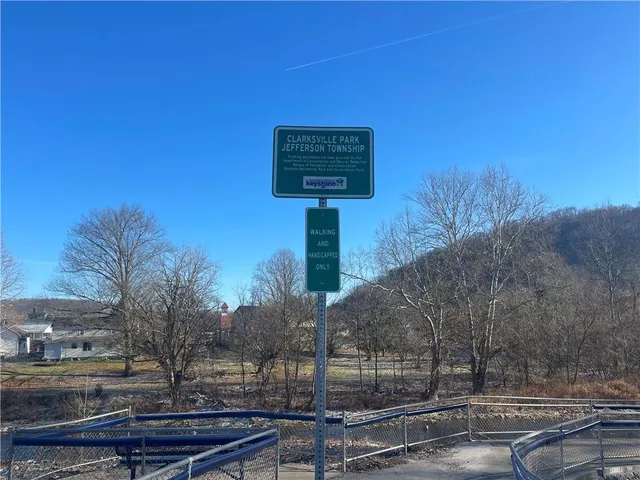 a sign on the side of a road