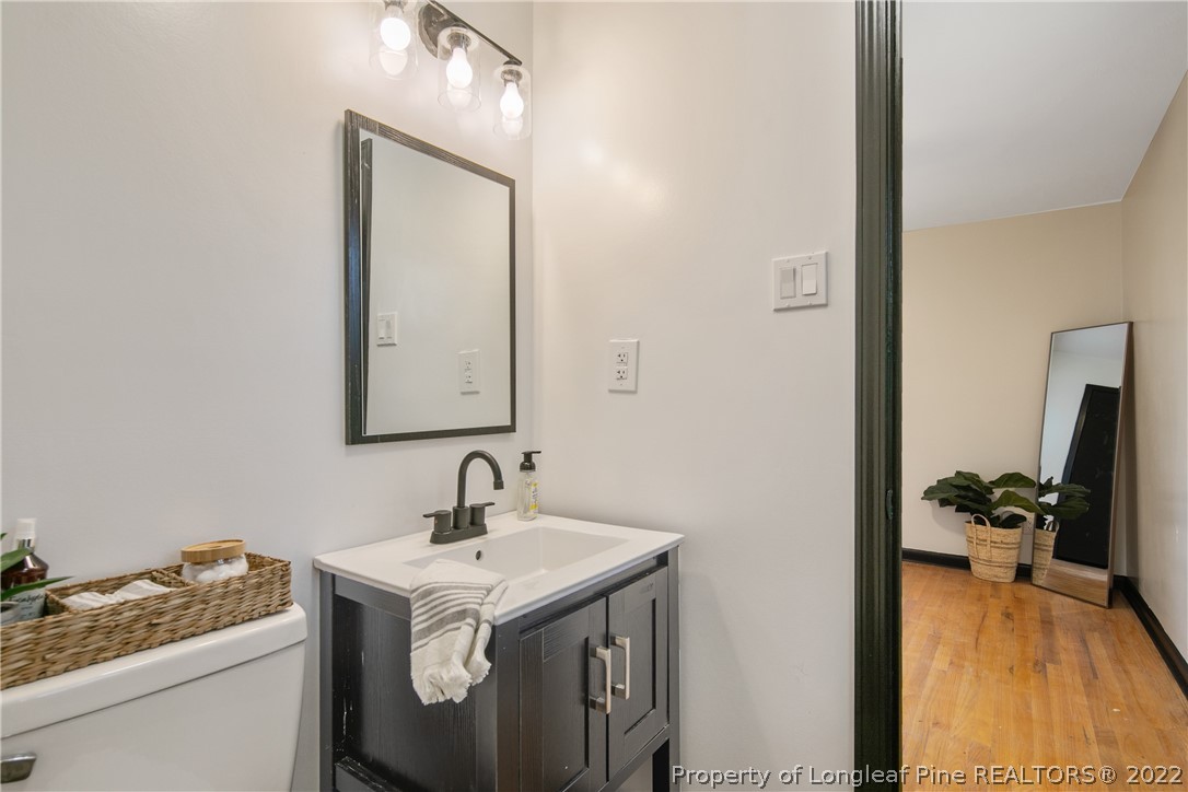 2743 George Owen Road Fayetteville, NC 28306 - Photo 33 of 47 a bathroom with a sink and a mirror