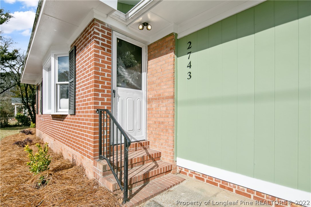 2743 George Owen Road Fayetteville, NC 28306 - Photo 4 of 47 a view of a balcony with door