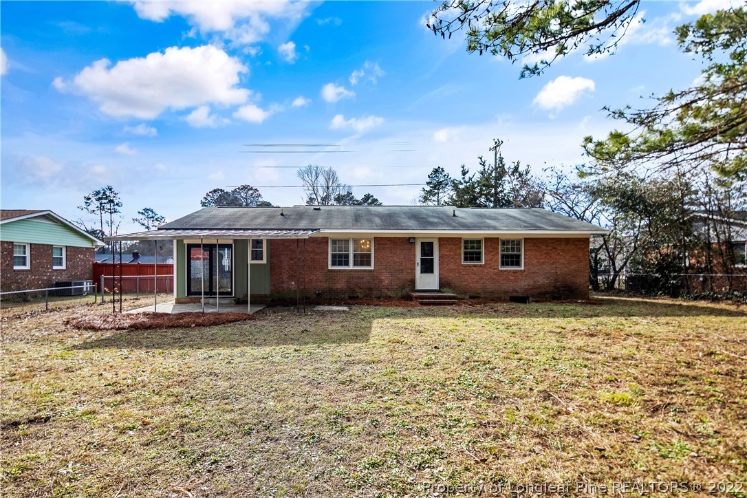 2743 George Owen Road Fayetteville, NC 28306 - Photo 45 of 47 a view of a house with a yard