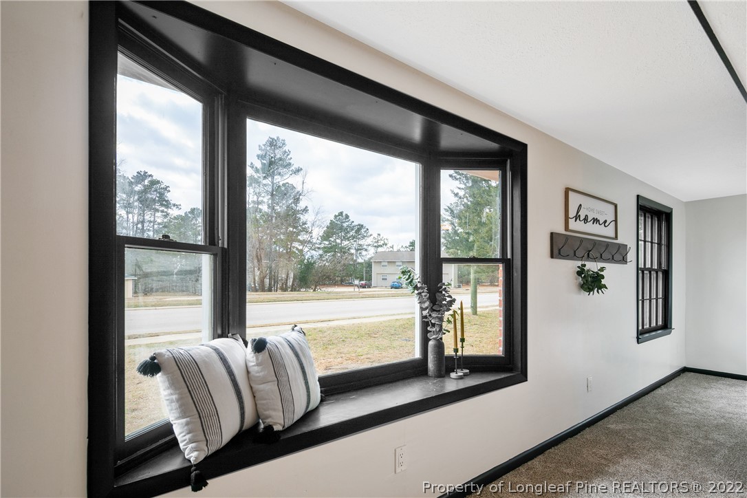 2743 George Owen Road Fayetteville, NC 28306 - Photo 6 of 47 a living room with furniture and a large window