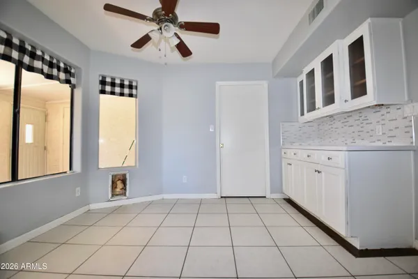 a view of a kitchen with a sink