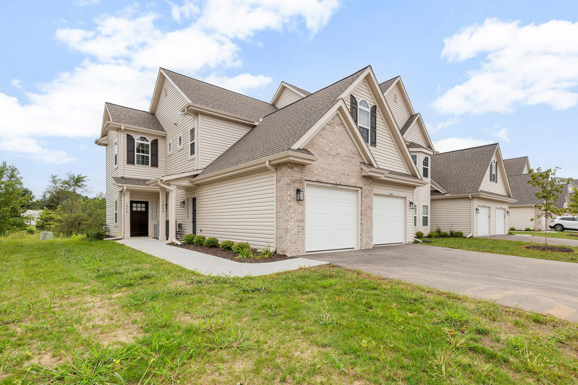 1867 Woodland Way, Unit 4214 Slinger, WI 53086 - Photo 9 of 58 5-Exterior_1887 Woodland Way
