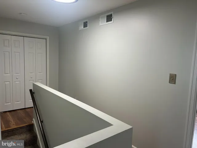 a view of small space with wooden floor