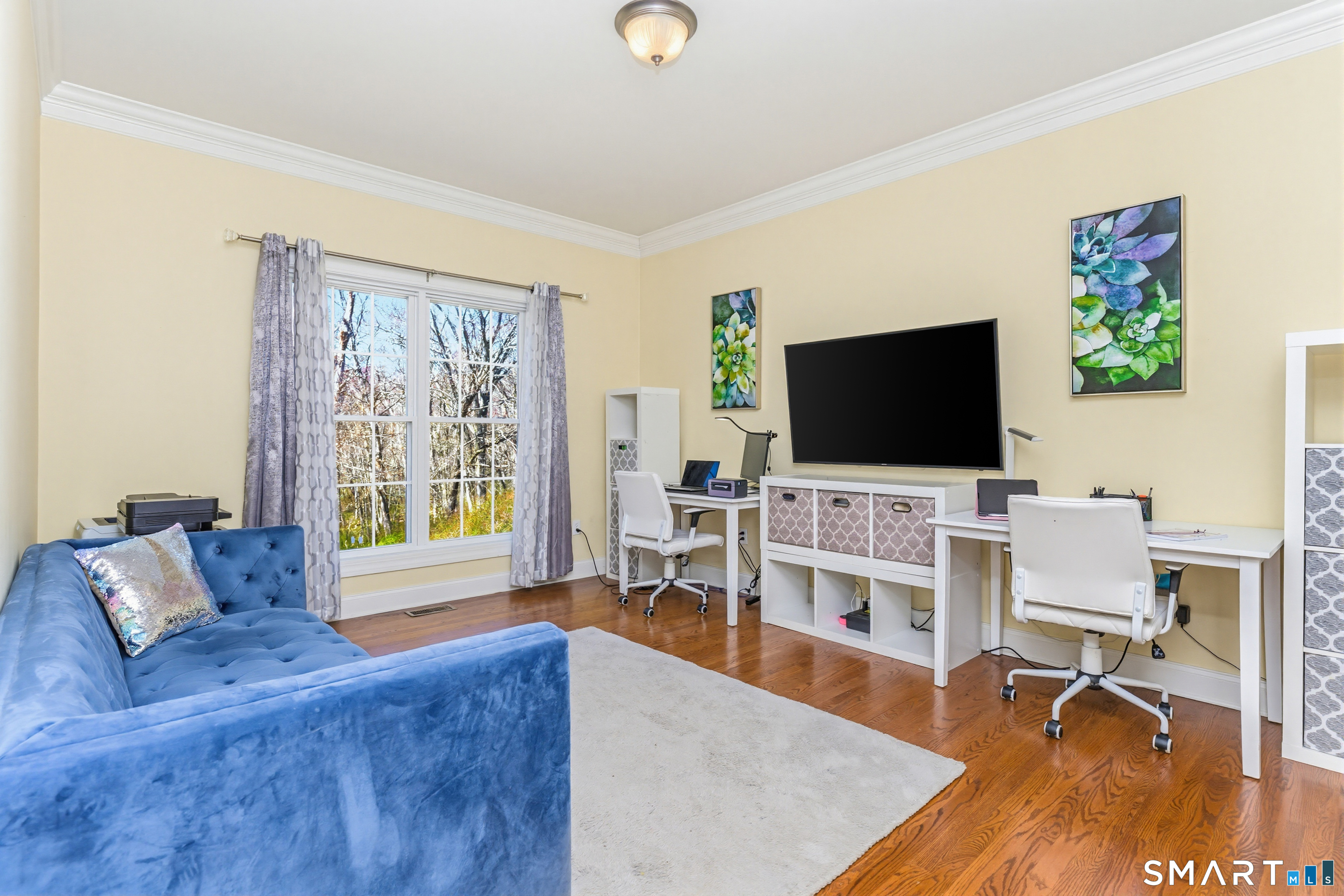30 Block Farm Road Monroe, CT 06468 - Photo 19 of 40 a living room with furniture and a flat screen tv