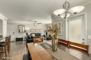 4850 East Desert Cove Avenue, Unit 227 Scottsdale, AZ 85254 - Photo 11 of 32 a living room with furniture