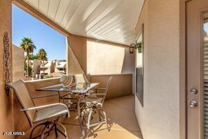 4850 East Desert Cove Avenue, Unit 227 Scottsdale, AZ 85254 - Photo 23 of 32 a view of an outdoor dining space with furniture