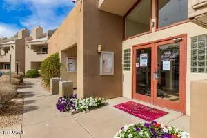 a front view of a building with an outdoor space