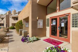 4850 East Desert Cove Avenue, Unit 227 Scottsdale, AZ 85254 - Photo 25 of 32 a front view of a building with an outdoor space