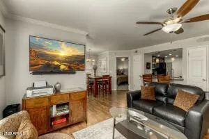 a living room with furniture and a flat screen tv